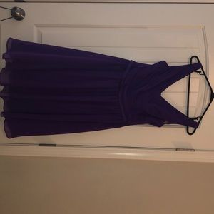 A purple homecoming, prom, bridesmaid dress.